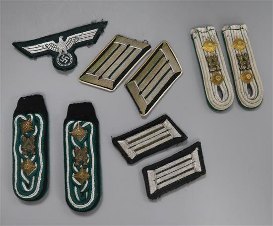 A pair of original shoulder straps, collar patches and breast eagle, a pair of shoulder straps and pair of collar patches